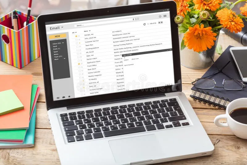 Laptop showing an email inbox representing cold email deliverability