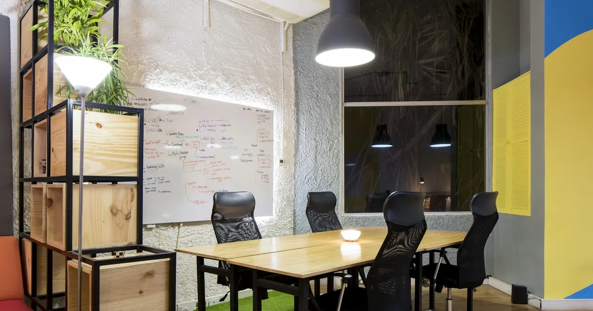 Empty meeting room with a whiteboard, illustrating strategic objectives left without a named owner